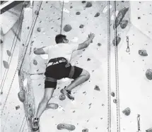  ??  ?? A climber tackles a rope course at The Studio Indoor Climbing Gym in downtown San Jose.