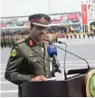  ??  ?? An army officer delivers a speech during the ceremony.