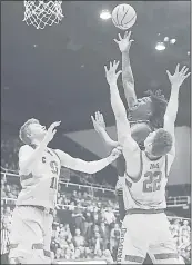  ?? MARCIO JOSE SANCHEZ — ASSOCIATED PRESS ?? Stanford’s Reid Travis (22) and Michael Humphrey defend Arizona State forward Romello White during Wednedsday’s game at Maples Pavilion.