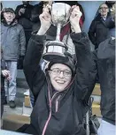  ??  ?? Happy days Kilby fan Thomas got his hands on the Lowland trophy last season