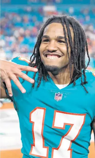  ?? JOHN MCCALL/SOUTH FLORIDA SUN SENTINEL ?? Dolphins wide receiver Jaylen Waddle walks off the field after beating the Patriots at Hard Rock Stadium on Jan. 9 in Miami Gardens.