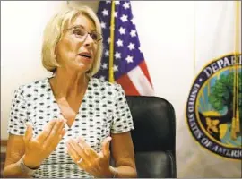  ?? Alex Brandon Associated Press ?? “WE CAN, and must, condemn sexual violence and punish those who perpetrate it,” with “a fair grievance process,” says Education chief Betsy DeVos, seen in 2017.