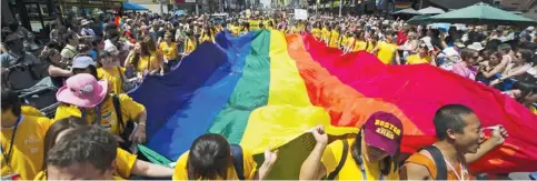  ?? MARK BLINCH / REUTERS ?? Pride Toronto said its arm’s-length dispute resolution panel has decided that QuAIA will receive a permit to participat­e in Sunday’s Pride parade.