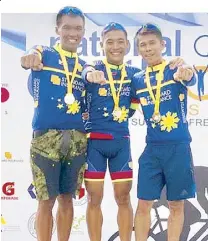  ??  ?? The Standard Insurance duathlon team dominated the elite division in the National Duathlon Championsh­ip Sunday at the Subic Bay Freeport. Jarwin Banatao clocked one hour, 57 minutes and 42 seconds to keep the crown the 10K run, 40K bike, 5K run...