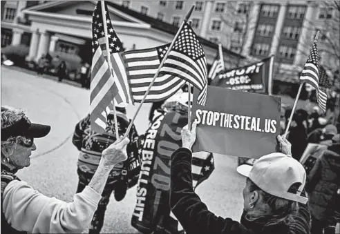  ?? SAMUEL CORUM/GETTY ?? Supporters of President Trump gather outside of theWyndham Gettysburg hotel before a Pennsylvan­ia Senate Majority Policy Committee public hearingWed­nesday.