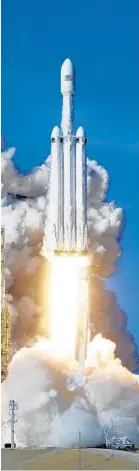  ?? JOHN RAOUX/AP ?? The Falcon Heavy lifts off from pad 39A at the Kennedy Space Center on Tuesday.