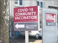  ?? Tyler Sizemore / Hearst Connecticu­t Media ?? A COVID-19 vaccinatio­n “super site” in Stamford last month. Everyone in the state 16 and over is now eligible.