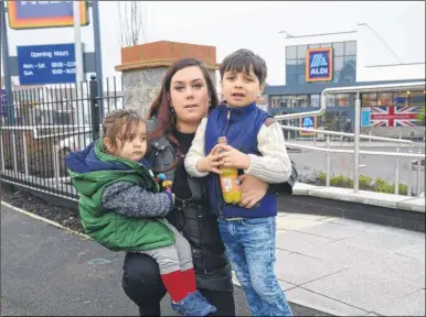  ?? Picture: Gary Browne FM5047295 ?? Gemma Bird with her son Eddie, five, and his brother Samir, 21 months, at Aldi in Langley Park, where she has complained about a manager