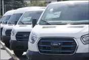  ?? MARTA LAVANDIER — THE ASSOCIATED PRESS FILE ?? Ford E-Transit electric vans are displayed at a Gus Machado Ford dealership in Hialeah, Fla., on Jan. 23.