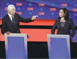  ?? Jim Watson AFP/Getty Images ?? FORMER Vice President Joe Biden and Sen. Kamala Harris sparred in what CNN billed as a “rematch” at its Democratic presidenti­al candidate debates.