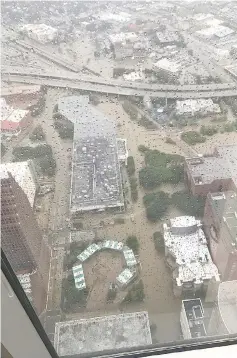  ??  ?? Flooded Houston downtown is seen from JP Morgan Chase Tower in this picture obtained from social media. — Reuters photo