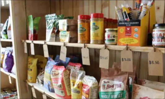  ?? PHOTOS BY MICHILEA PATTERSON — FOR DIGITAL FIRST MEDIA ?? A variety of plant-based food products are displayed on a shelf at the Firefly Café Outpost, an all-vegan grocery store in Boyertown.