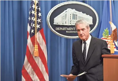  ?? AFP/GETTY IMAGES ?? Special counsel Robert Mueller recounted his report’s findings, saying Russia launched a “concerted” effort to interfere with the election.