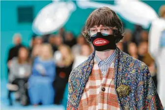  ?? Antonio Calanni / Associated Press file photo ?? Global fashion brands have faced racial backlashes in the past, notably in the wake of scandals such as the Gucci knitwear recalling blackface in 2018.