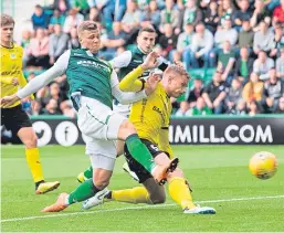  ?? Picture: SNS. ?? Florian Kamberi nets Hibs’ second goal.