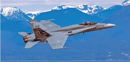  ?? VIA DEREK HEYES ?? The Royal Canadian Air Force’s Demo Team will conduct a flypast of Greater Victoria about 2 p.m. today. For 2021, the team’s CF-18 demo jet features a paint scheme with an eagle graphic on its tail.