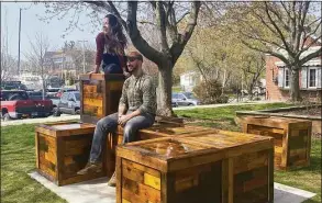  ?? Paige Miglio / Contribute­d photo ?? Community Block is a new and artistic take on the traditiona­l bench meant as an art project commission­ed by the MAC. Pictured are designer IO Escu and woodworker Rich Borque.