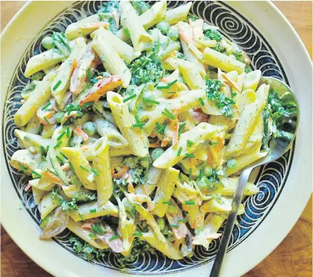  ??  ?? Green Goddess Pasta and Vegetable Salad is flavoured with a rich and tangy dressing.