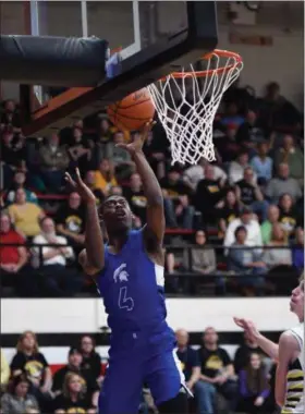  ?? PATRICK HOPKINS — FOR THE NEWS-HERALD ?? Richmond Heights’ Anthony Maxie Jr. shoots March 12 during a Division IV regional semifinal win over Bristol in Canton.