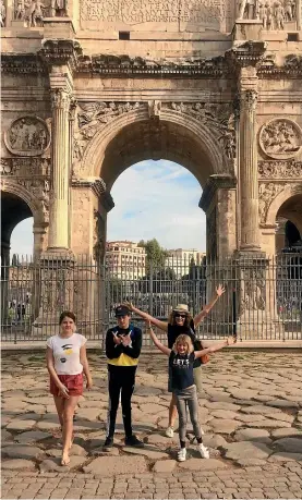  ?? MARY LONGMORE ?? Striking a pose in front of the Arch of Constantin­e in Rome.