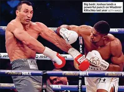  ?? GETTY IMAGES ?? Big bash: Joshua lands a powerful punch on Wladimir Klitschko last year