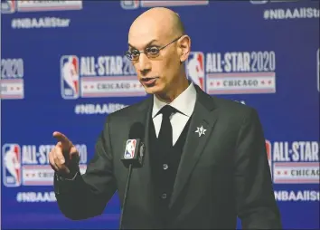  ?? GETTY IMAGES ?? NBA commission­er Adam Silver speaks to the media in February. Silver will do his utmost to make things as safe as possible when play resumes.