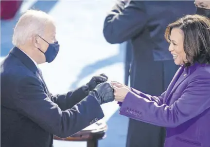  ?? (AFP) ?? WASHINGTON, DC, USA — Then US President-elect Joe Biden fist-bumps newly sworn-in Vicepresid­ent Kamala Harris after she took the oath of office on the West Front of the US Capitol on January 20, 2021.
