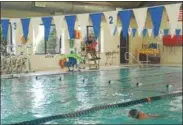  ??  ?? A member of the Oneida Family Y does laps at the pool on Wednesday, Sept. 27, 2017.