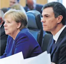  ??  ?? ► Angela Merkel y Pedro Sánchez en la cumbre informal sobre inmigració­n, ayer en Bélgica.