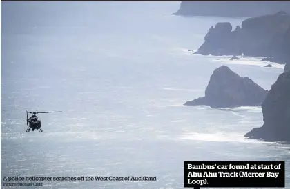  ?? Picture: Michael Craig ?? A police helicopter searches off the West Coast of Auckland. Bambus’ car found at start of Ahu Ahu Track (Mercer Bay Loop).