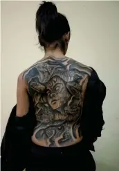  ??  ?? Neha has a tattoo of Medusa on her back.