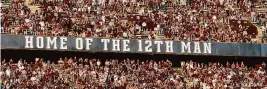  ?? Associated Press file photo ?? Texas A&M fans cheer as the team takes the field for a football game in 2020. Traditions have fallen or changed before — for the better.