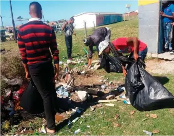  ??  ?? The Sisonke Youth Developmen­t group members cleaned a property. Now they hope to use it as a base for their upliftment programmes.