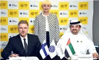  ?? — Photo by Shihab ?? Severi Keinala, Najeeb Mohammed Al Ali and Riitta Swan during the agreement signing ceremony. Finland officially announced its plans to participat­e in Expo 2020 in Dubai on Monday.