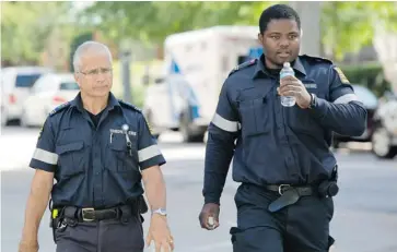  ?? TYLER ANDERSON/POSTMEDIA NEWS ?? Paramedic Marc Dugas, left, was one of the first to find Jeffrey Baldwin, 5, who died weighing just 21 pounds.