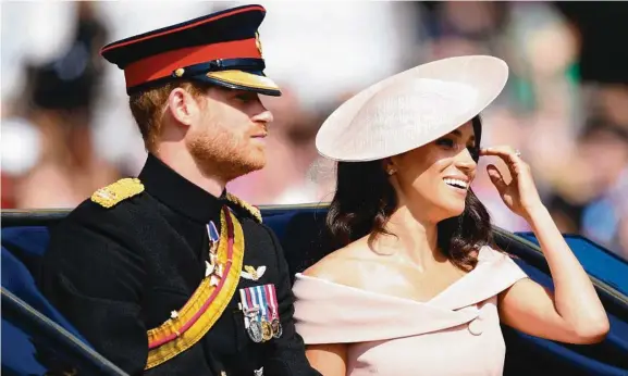  ?? Picture: JAMES WHATLING / MEGA ?? Prince Harry, Duke of Sussex and Meghan Markle, Duchess of Sussex (pictured at Trooping the Colour) will travel to Australia in October.
