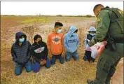  ??  ?? THE NUMBER of unaccompan­ied minors arriving has strained the Border Patrol, authoritie­s say.