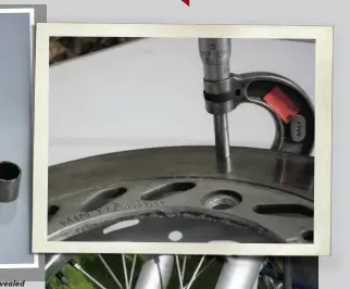  ??  ?? Above and top right: Applying a micrometer to the front brake disc revealed that it was well worn and needed replacemen­t