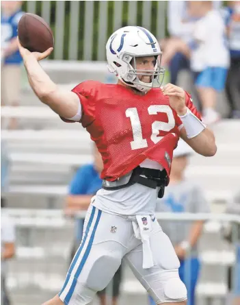  ?? MICHAEL CONROY/AP ?? Colts quarterbac­k Andrew Luck said after his first three days of training camp, “It was fun being able to focus on getting better at practice, not just getting through practice and surviving — surviving to the next one.”