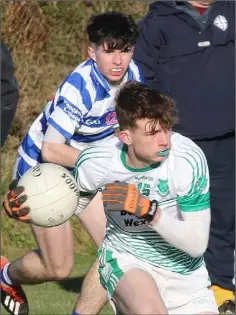  ??  ?? Paul Hearne of St. Peter’s has Oisín Doyle watching his every move.