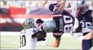  ?? Steven Senne / Associated Press ?? The New England Patriots Gunner Olszewski (80) is upended by the New Orleans SaintsAlex Armah (40) during the second half on Sunday in Foxborough, Mass.