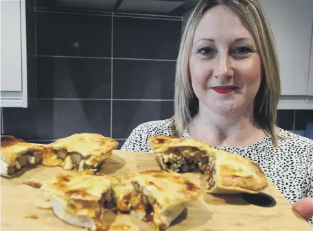  ??  ?? Wearside firm Tarts & Traybakes founder Nicola Ward with her cheesy chips in a pie for Sunderland AFC fans.