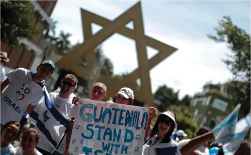  ??  ?? PRO-ISRAELI activists attend a demonstrat­ion near the ‘Plaza of Israel’ in Guatemala City in 2014.