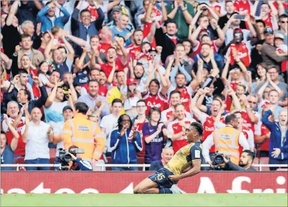  ?? Photo: Paul Hackett/Reuters ?? With the big guns: Alex Iwobi, star of the the Under-19 team, scored for the Arsenal senior team in a pre-season friendly.