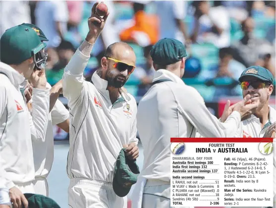  ??  ?? MAIN MAN: Australia's Nathan Lyon celebrates the dismissal of India's Kuldeep Yadav during the third day of fourth Test at Dharamsala.