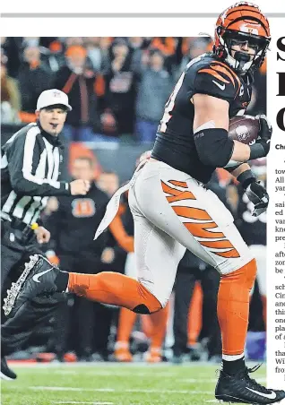  ?? KAREEM ELGAZZAR/ THE CINCINNATI ENQUIRER ?? Bengals defensive end Sam Hubbard recovered and returned a fumble for a touchdown in the fourth quarter during the AFC wild- card playoff victory against the Ravens.