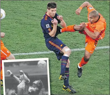  ??  ?? The karate kick of Nigel de Jong on Spain’s Xabi Alonso in 2010, or Maradona’s ‘Hand of God’ goal in 1986 likely wouldn’t have survived the VAR process being put into play at the World Cup.