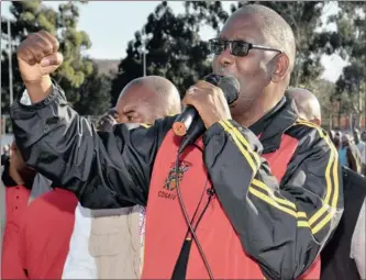  ?? PHOTO: TIMOTHY BERNARD ?? Thousands of workers at Gold Fields’ Kloof-Driefontei­n Complex in Carletonvi­lle, who have been on strike since last week, welcomed an address by Cosatu general secretary Zwelinzima Vavi yesterday. He rushed from Cosatu’s national congress to advise the workers about their unprotecte­d strike. Gold Fields secured a court interdict last Monday to end the strike and Vavi said the company had intended to use it to discipline workers by today. He vowed to return today with National Union of Mineworker­s executives to help chart a way forward. Gold Fields denied any intention to dismiss staff. – Staff reporter