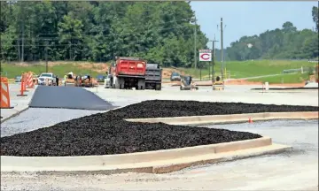  ?? Jeremy stewart ?? Crews continue working on the new front parking lot and driveway at Cedartown High School. The project was close to completion on Thursday, July 22, and was expected to be done before students return to classes on Aug. 3.