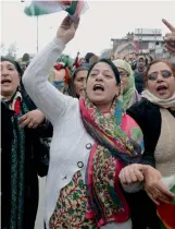  ??  ?? Congress leaders and workers shout slogans during a protest rally against Union minister Giriraj Singh at Lal Chowk in Srinagar on Thursday. Party workers burn Mr Singh’s effigy in Lucknow.